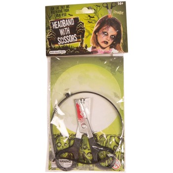 Serre-tête ciseaux planté dans la tête