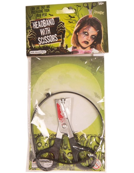 Serre-tête ciseaux planté dans la tête